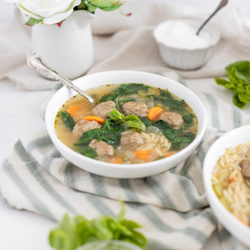 Turkey Pesto Meatball Soup in a white bowl