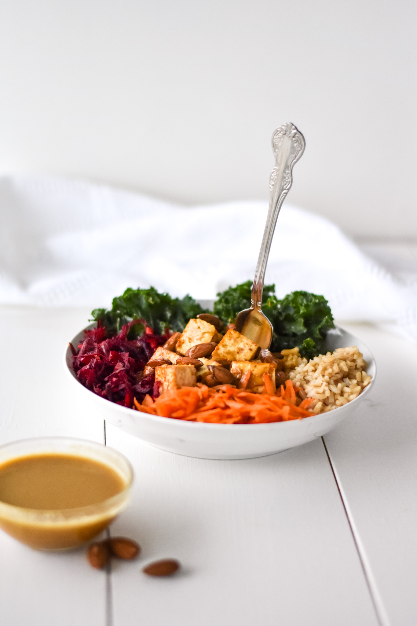 Kale tofu glory bowl with fork