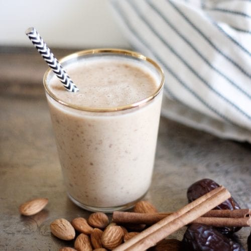 Chai tea smoothie in gold rimmed glass
