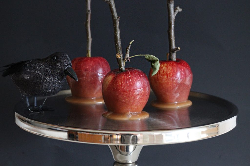 Caramel apples on metal serving tray