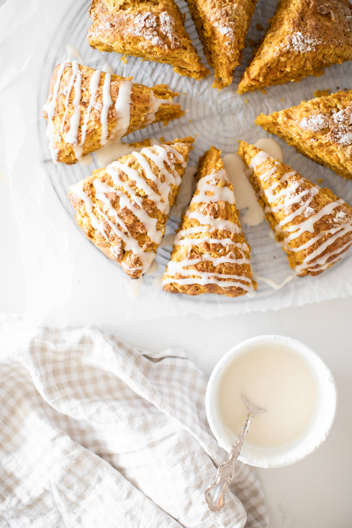 Pumpkin Scones with Vanilla Glaze ad cup of coffee