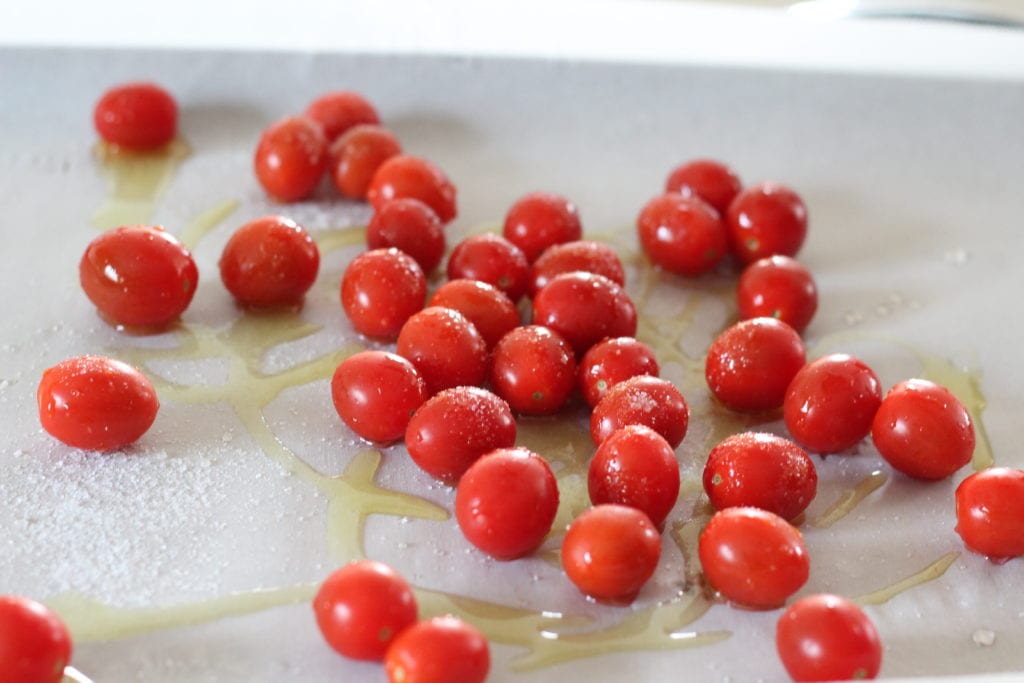 Cherry tomatoes sprinkled with olive oil 