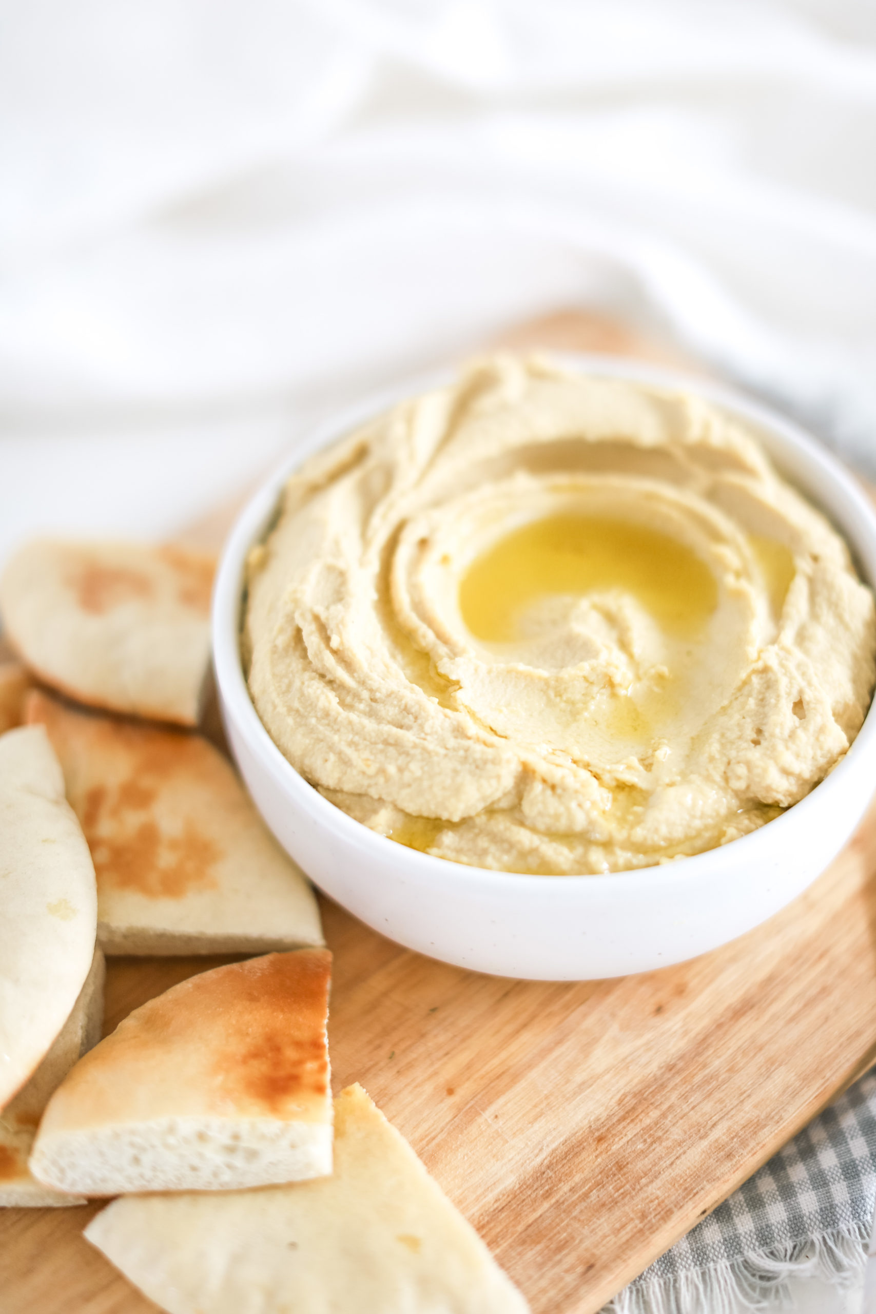hummus with olive oil served with pita 