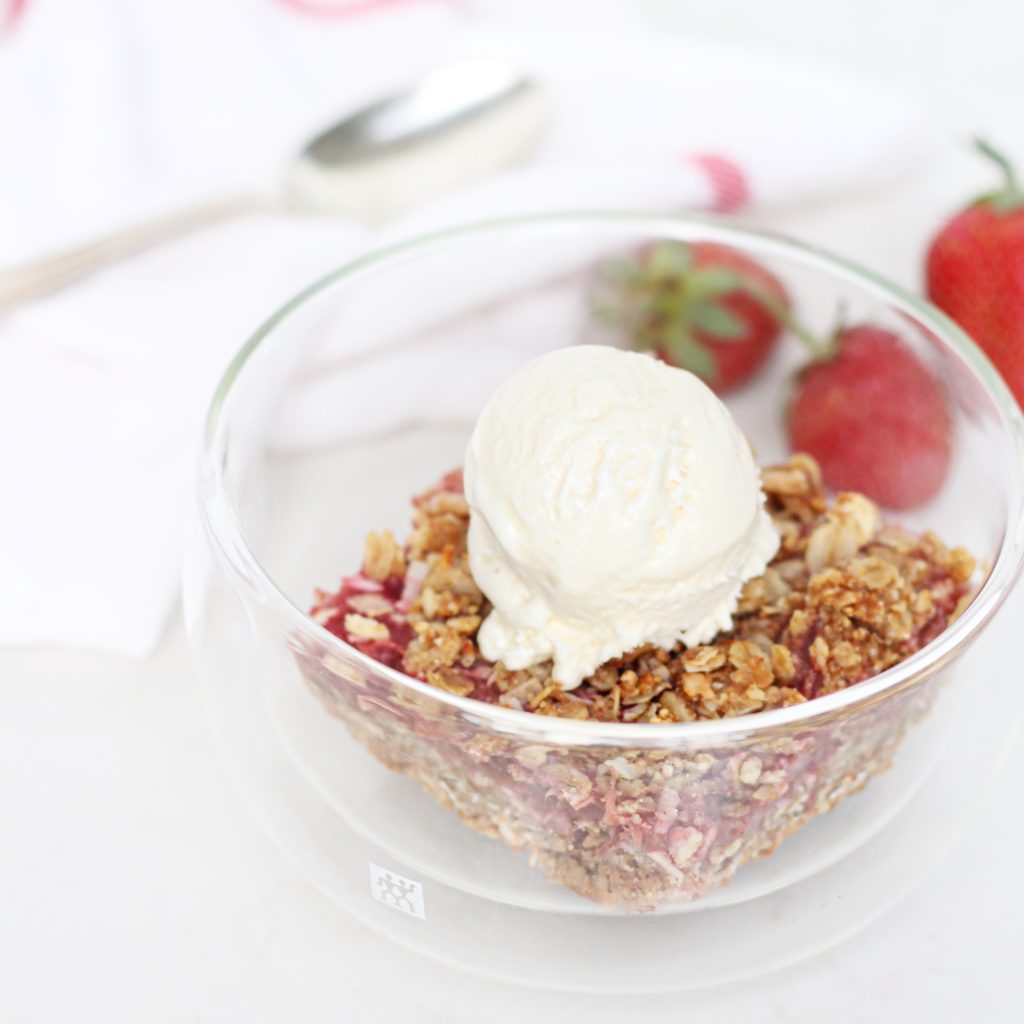 Strawberry Rhubarb Bar in clear glass bowl topped with ice cream