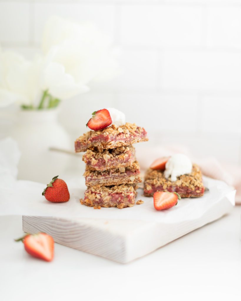 Strawberry Rhubarb Bars cut into squares stacked up