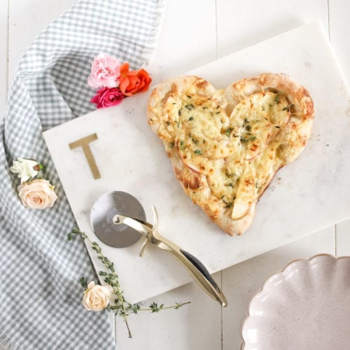 heart-shaped pizza with apple and thyme