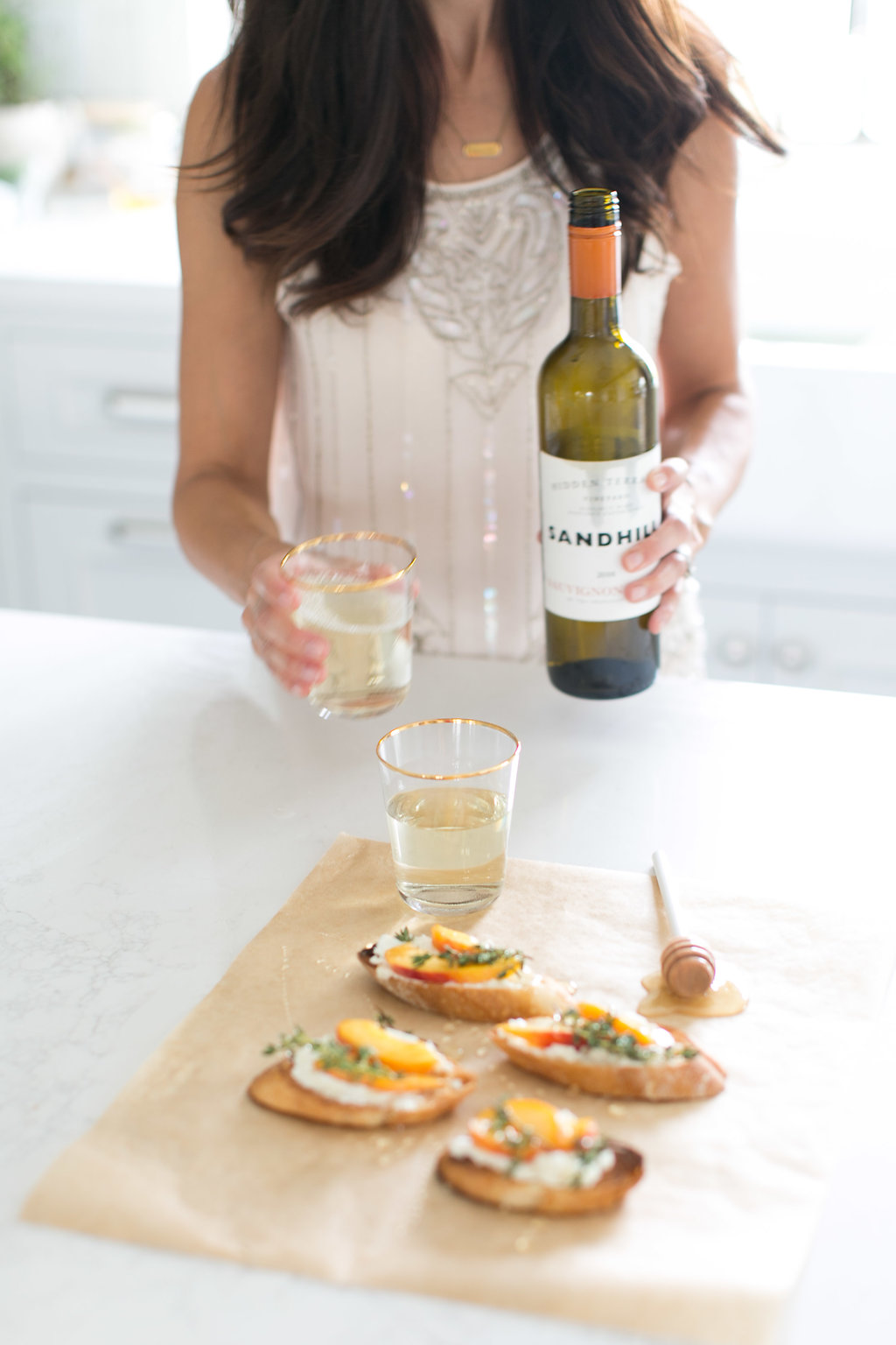 This Peach Chèvre Crostini is a perfect pair for a Sandhill wine 