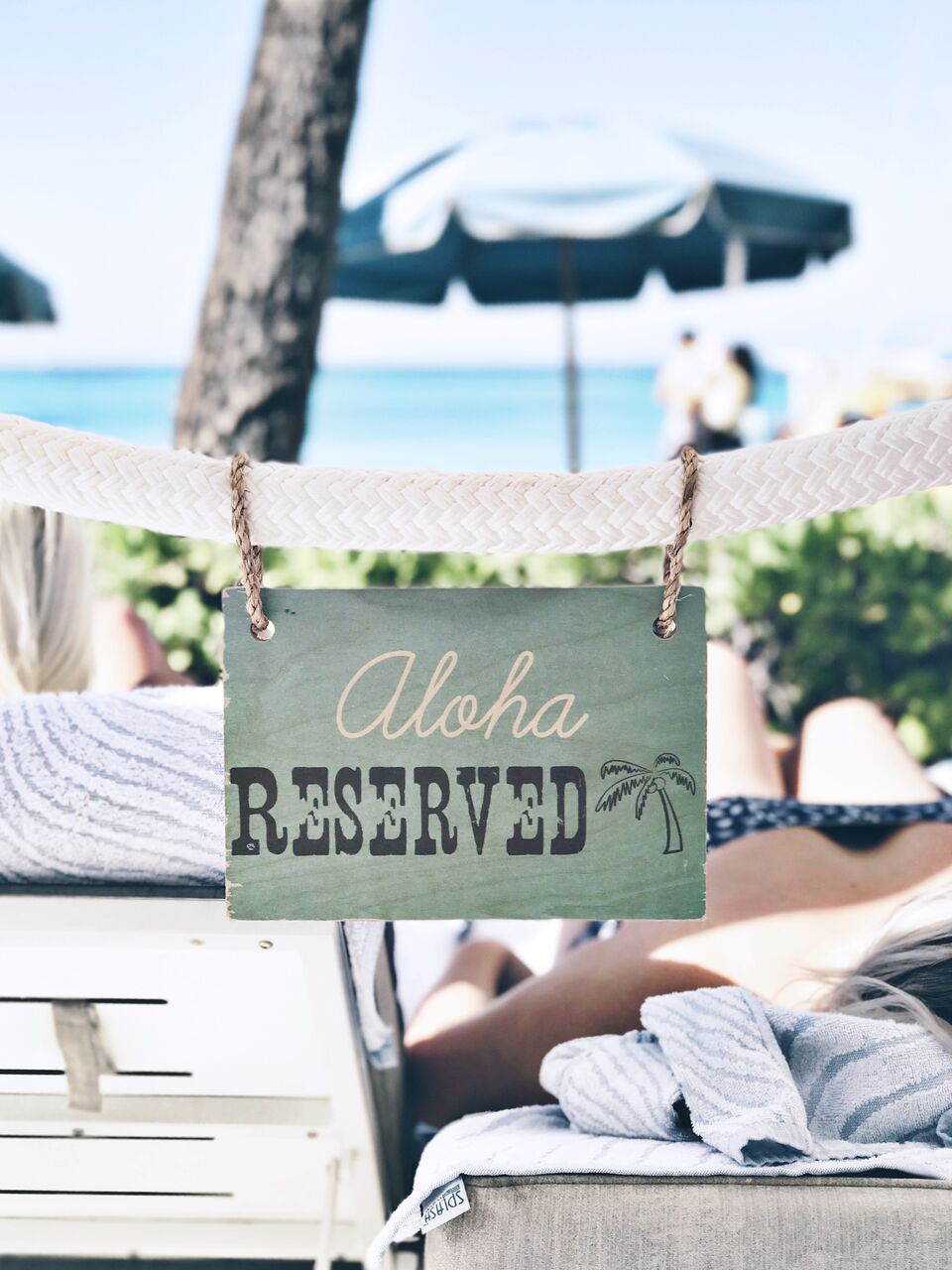 Aloha Reserved sign on the cabana at the Moana Surfrider Hotel in Honolulu Hawaii