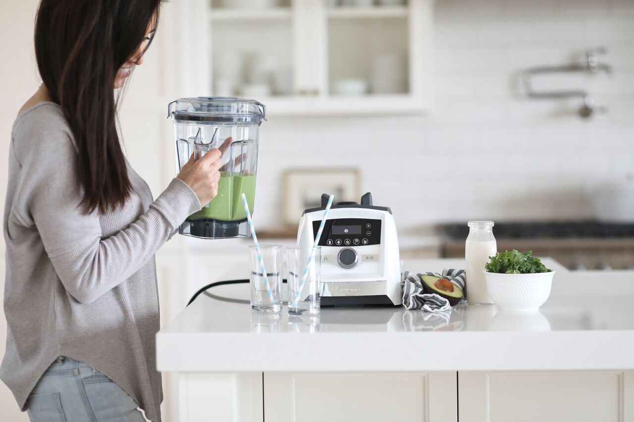 Dietitian's Green Smoothie that the kids love made in a white Vitamix Ascent Series machine.