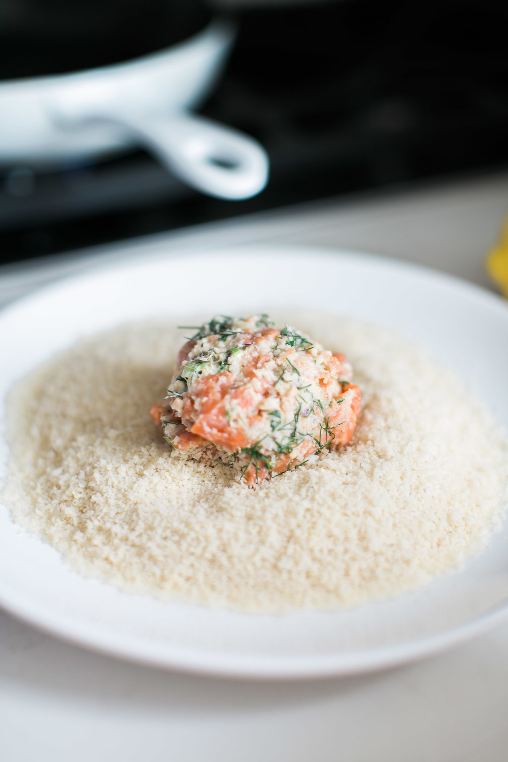 The BEST salmon cakes you will ever eat, made with smoked and fresh salmon and topped with an addictive homemade dill tartar sauce by Fraiche Nutrition.