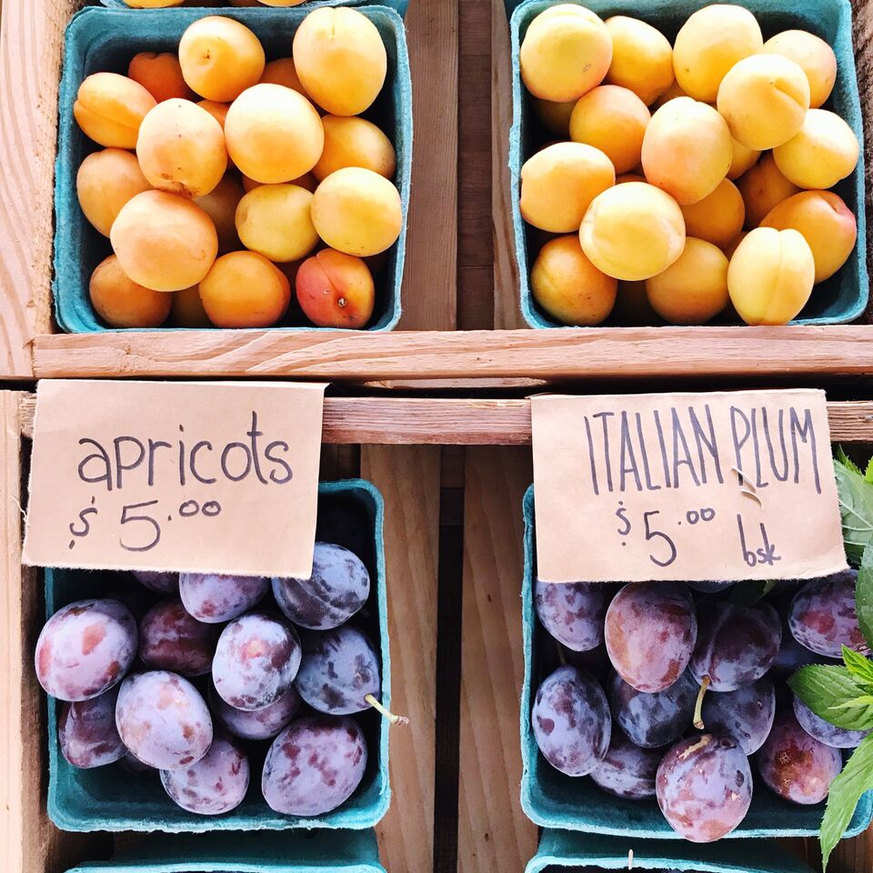 Apricots and Italian plums at the market