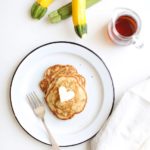 Zucchini Bread Pancakes with a heart-shaped butter