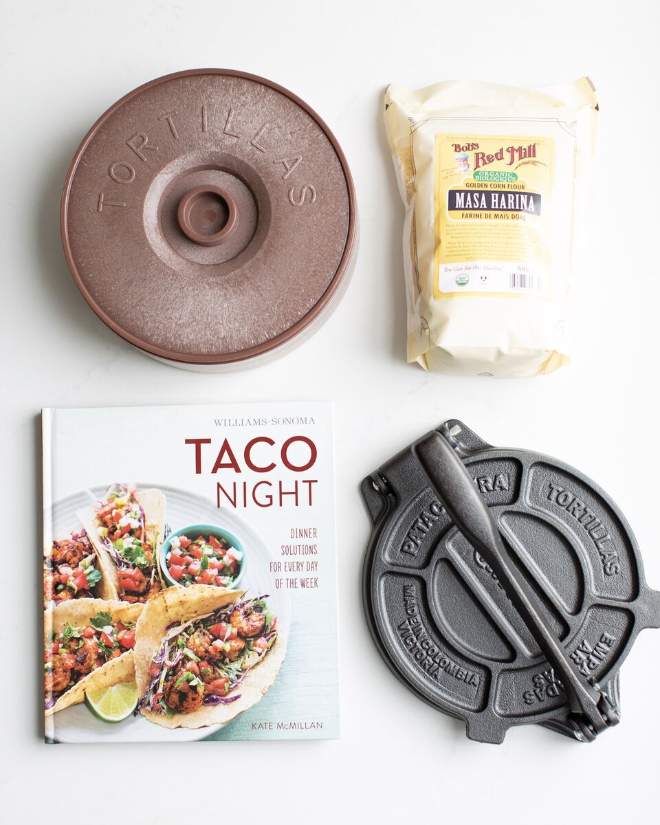 All the tools to make home-made corn tortillas! Tortilla warmer, masa harina, a tortilla press and an epic taco cookbook by Williams Sonoma!
