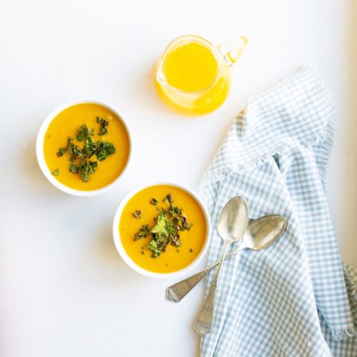 Dietitan-approved Orange Butternut Squash Soup with Kale Chips and a cozy white sweater for those crisp fall days!