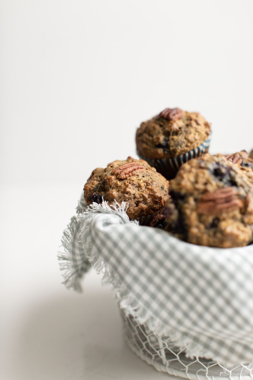 A basket full of Sneaky Mommy Muffins: Designed by a Registered Dietitian, these "Fruit and veggie" muffins filled with healthy vegetables, fibre, lightly sweetened with a vegan option! These freeze beautifully.