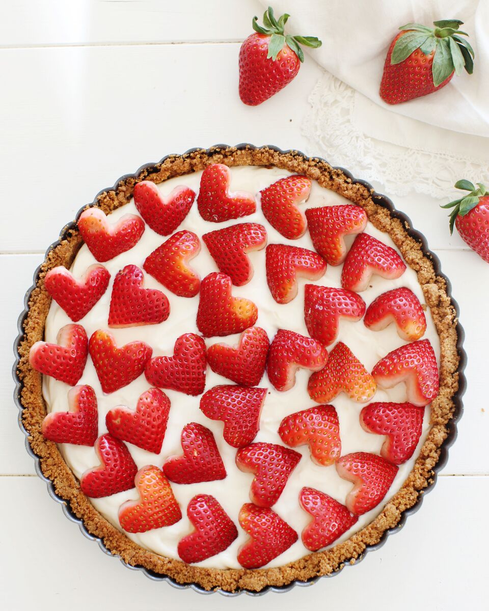 Strawberry & Cream Sweet-tart made with yogurt and topped with heart-shaped strawberries - perfect for Valentine's Day dessert !