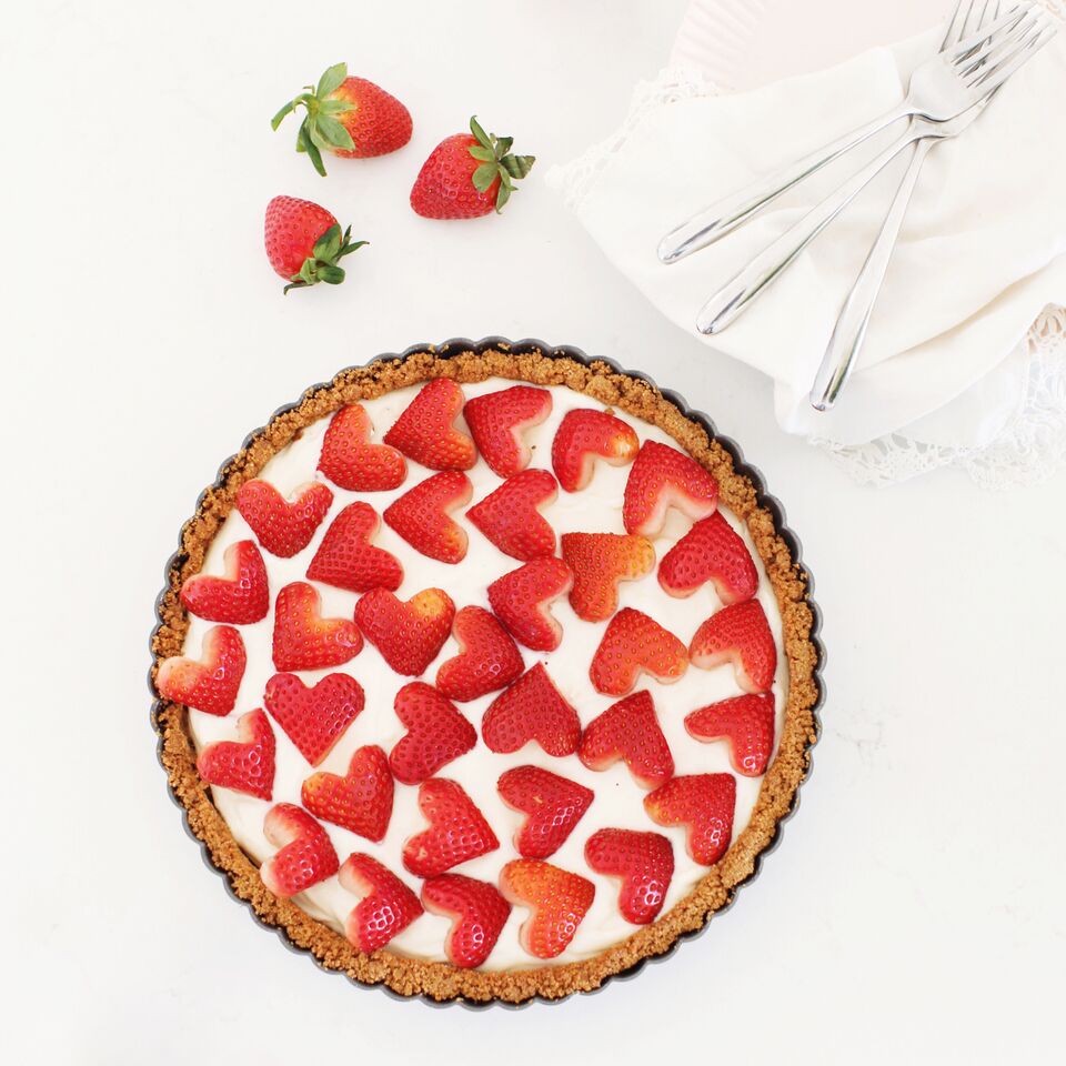 Strawberry & Cream Sweet-tart made with yogurt and topped with heart-shaped strawberries - perfect for Valentine's Day dessert !