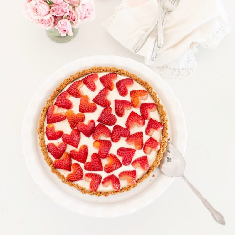 Strawberry & Cream Sweet-tart made with yogurt and topped with heart-shaped strawberries - perfect for Valentine's Day dessert !