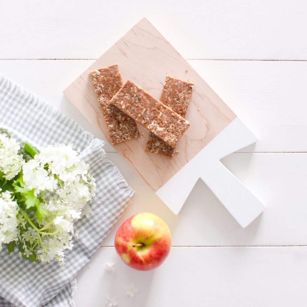 Apple Oat Bars that are nut free, no bake, gluten free and taste amazing! Made out of wholesome foods including dried apples, oats and sunflower seeds, they are perfect for school lunches!