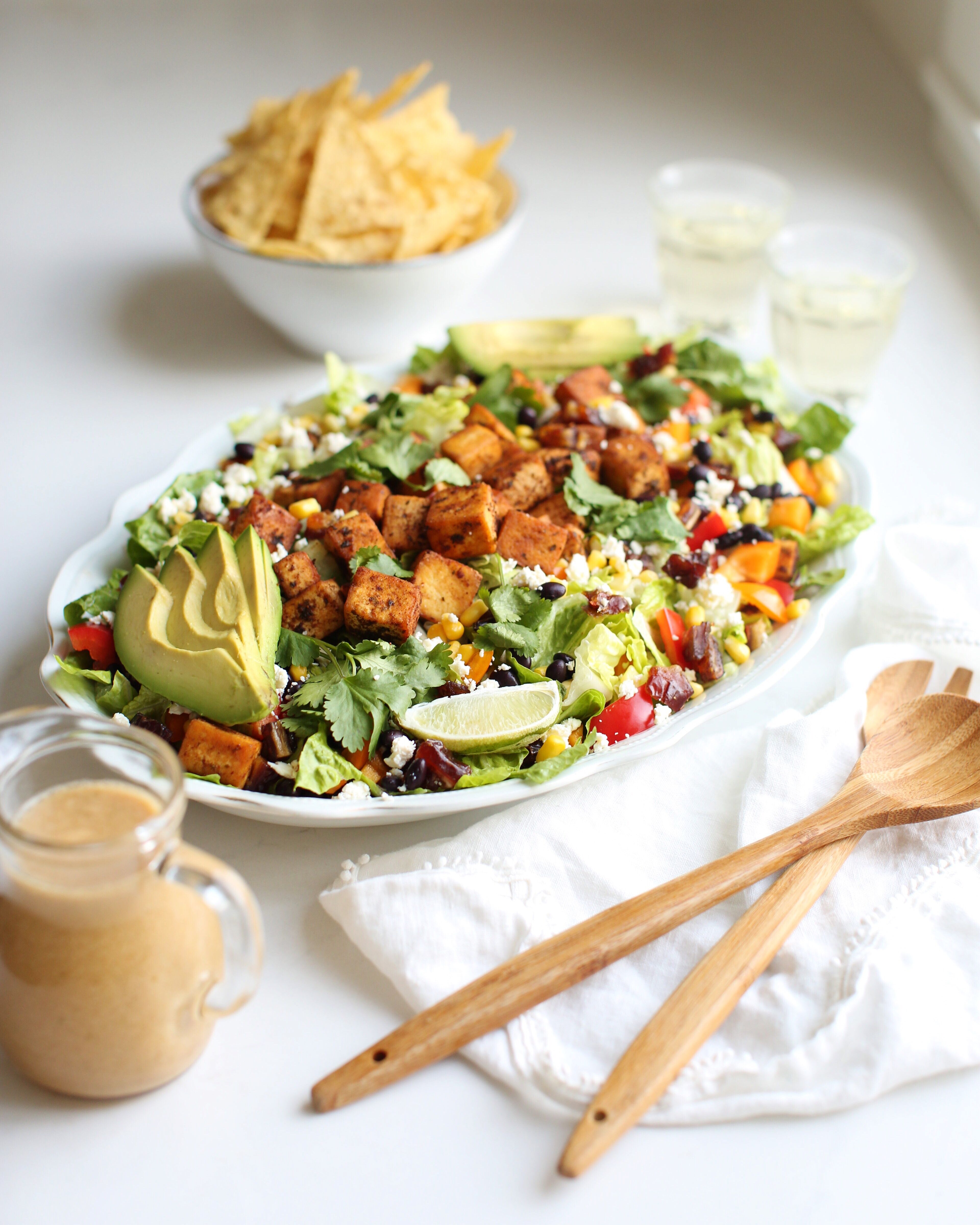Cowgirl Salad - a Santa Fe inspired salad topped with either cajun tofu or chicken and filled with healthy ingredients topped with a perfect peanut lime salad dressing
