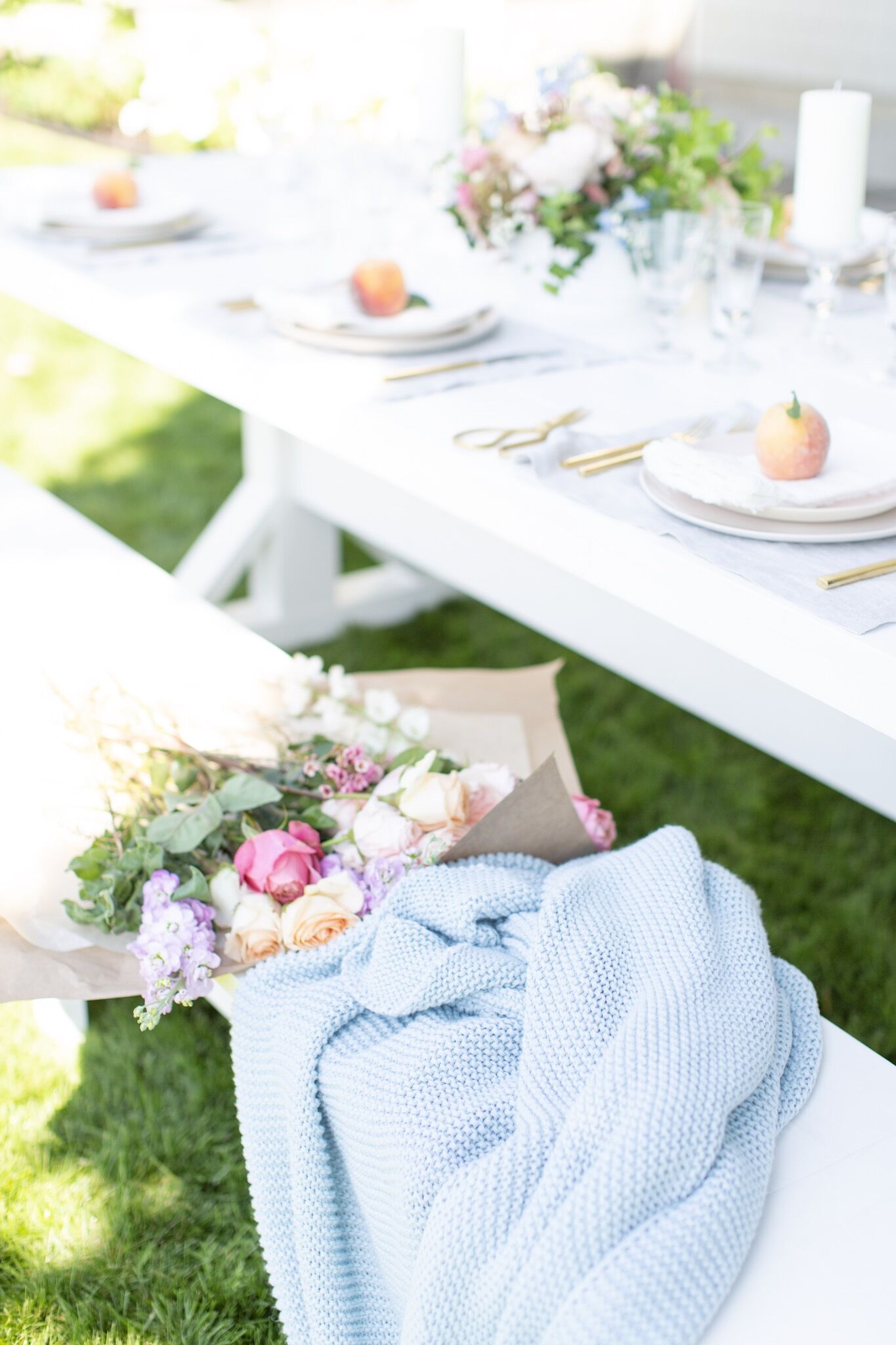 How to throw the best garden party complete with a white picnic table, a wine-paired menu, fresh flowers and a hostess schedule