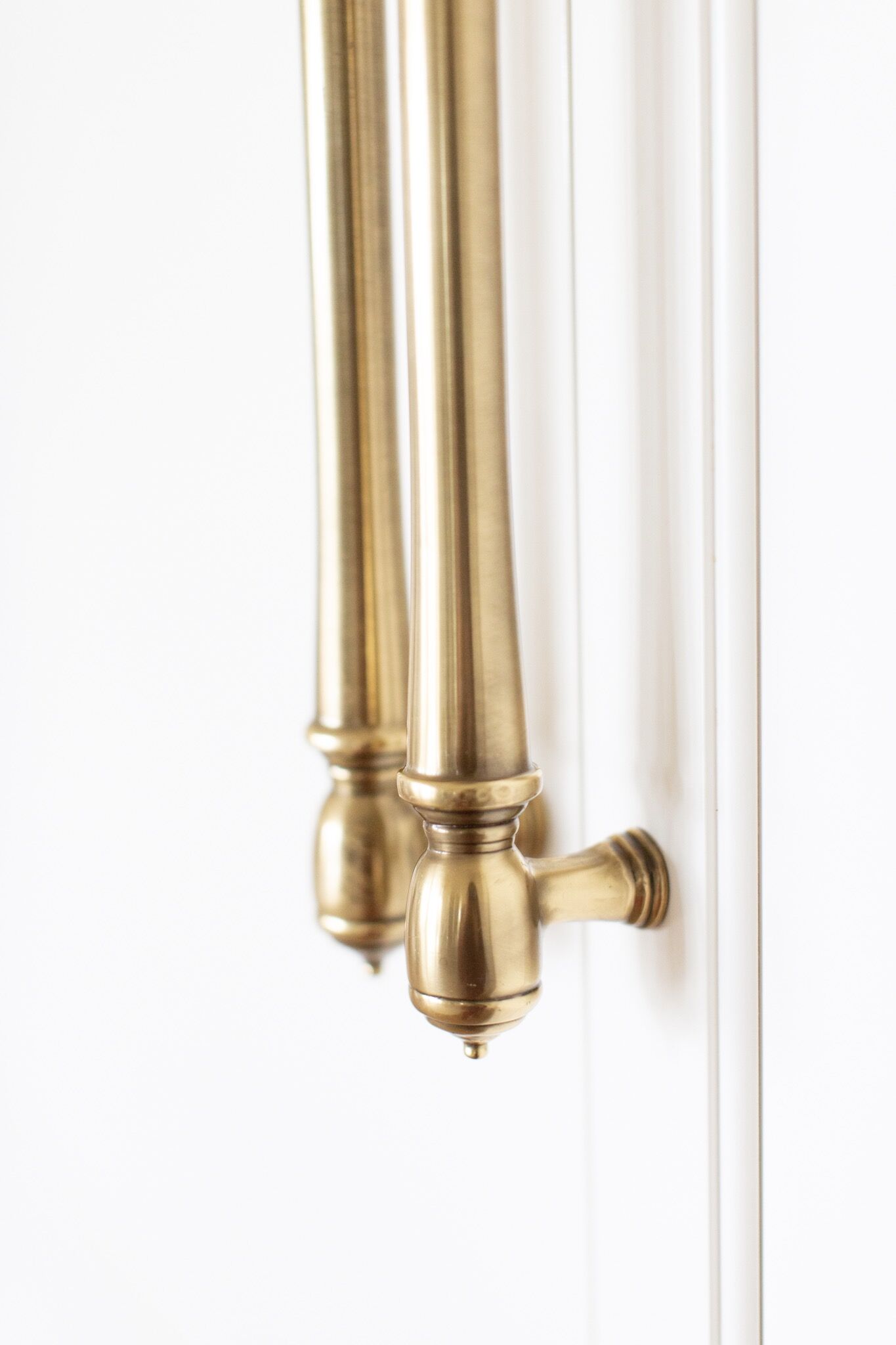 Double Door Integrated Fridges with brass hardware