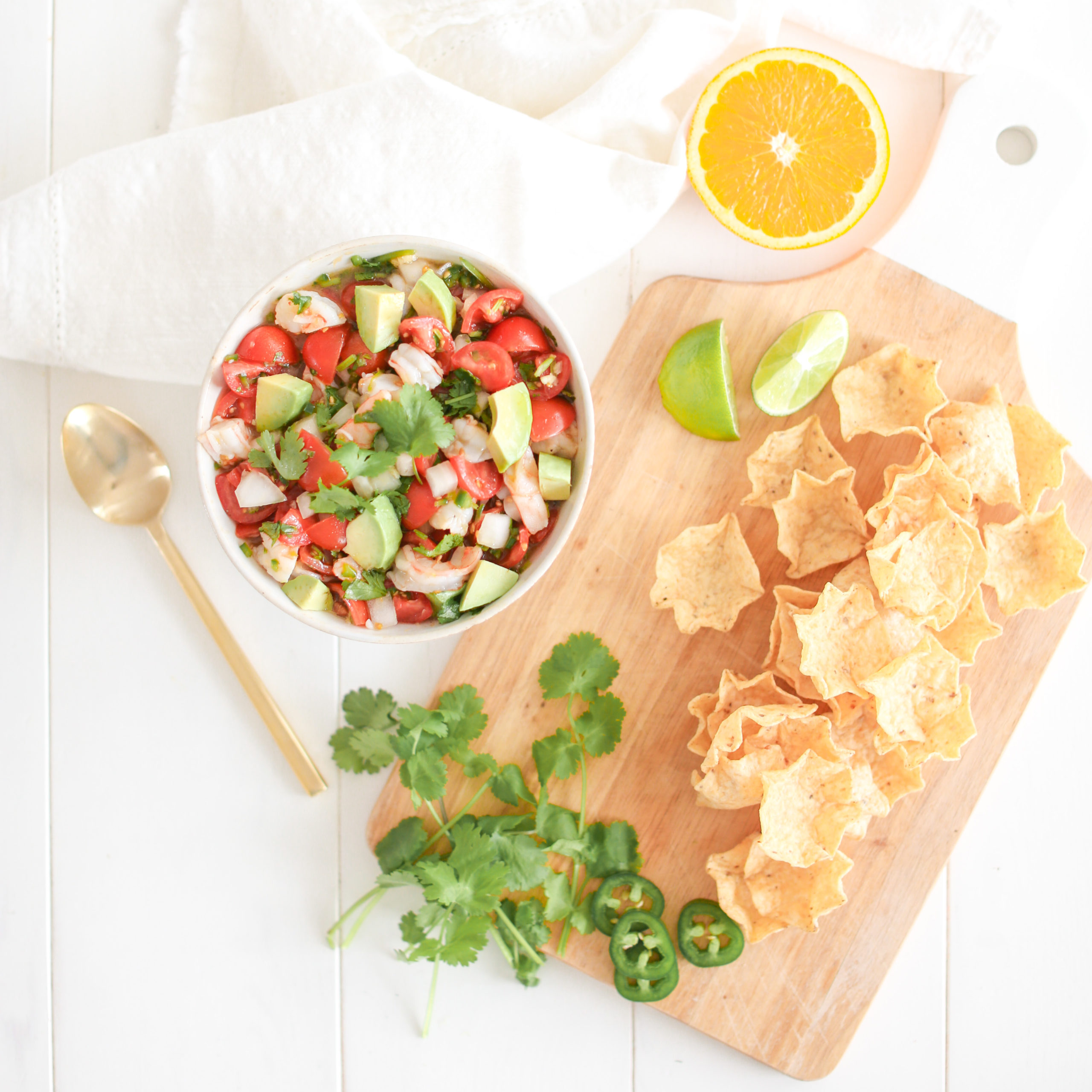 Shrimp Avocado Salsa with cherry tomatoes and tortilla chips