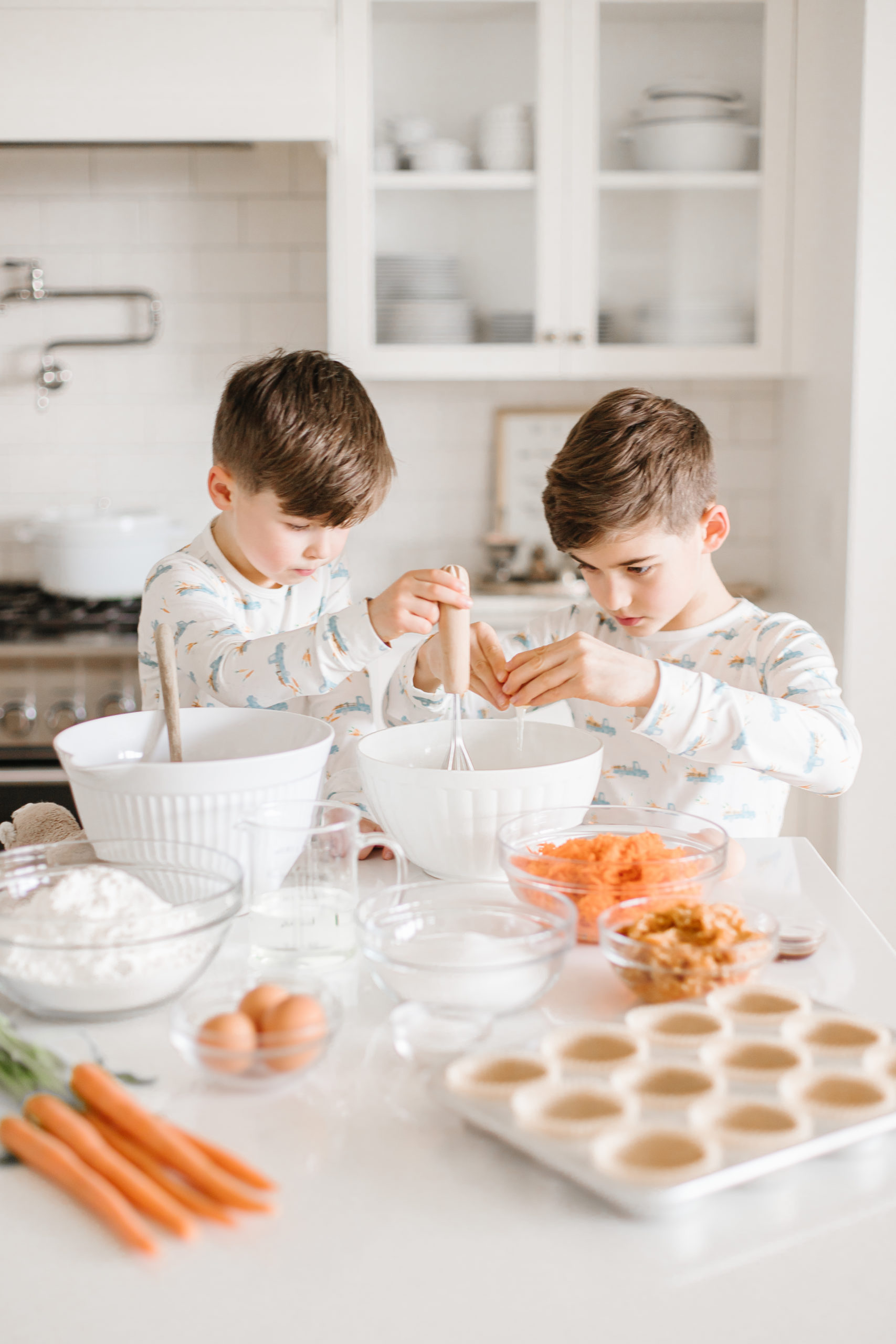 two boys baking together in the ktichen
