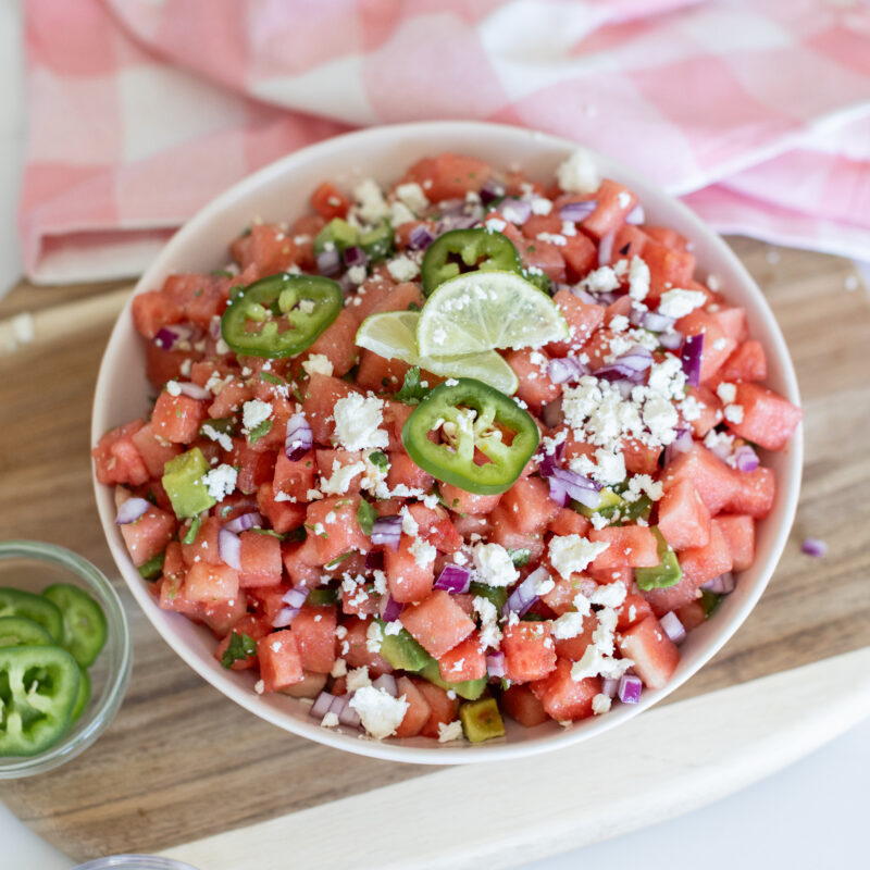 Vegan Watermelon Ceviche served in a bowl with avocado, lime, and jalapeño