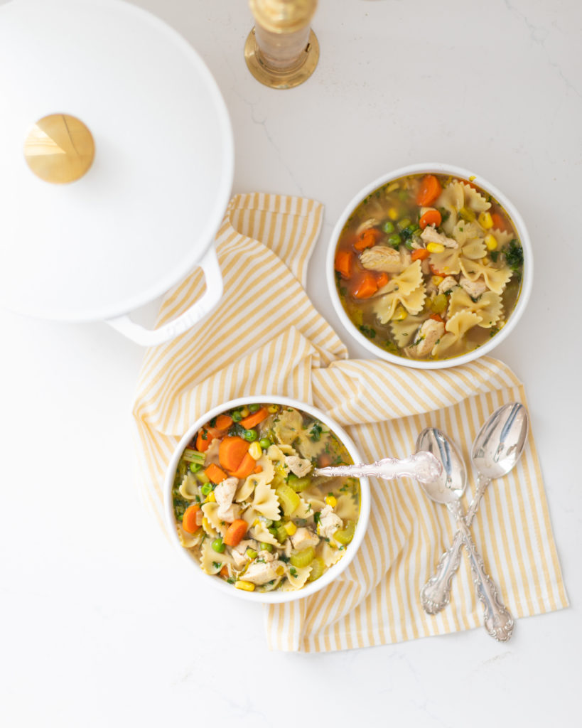 Turkey Soup in two bowls with spoons