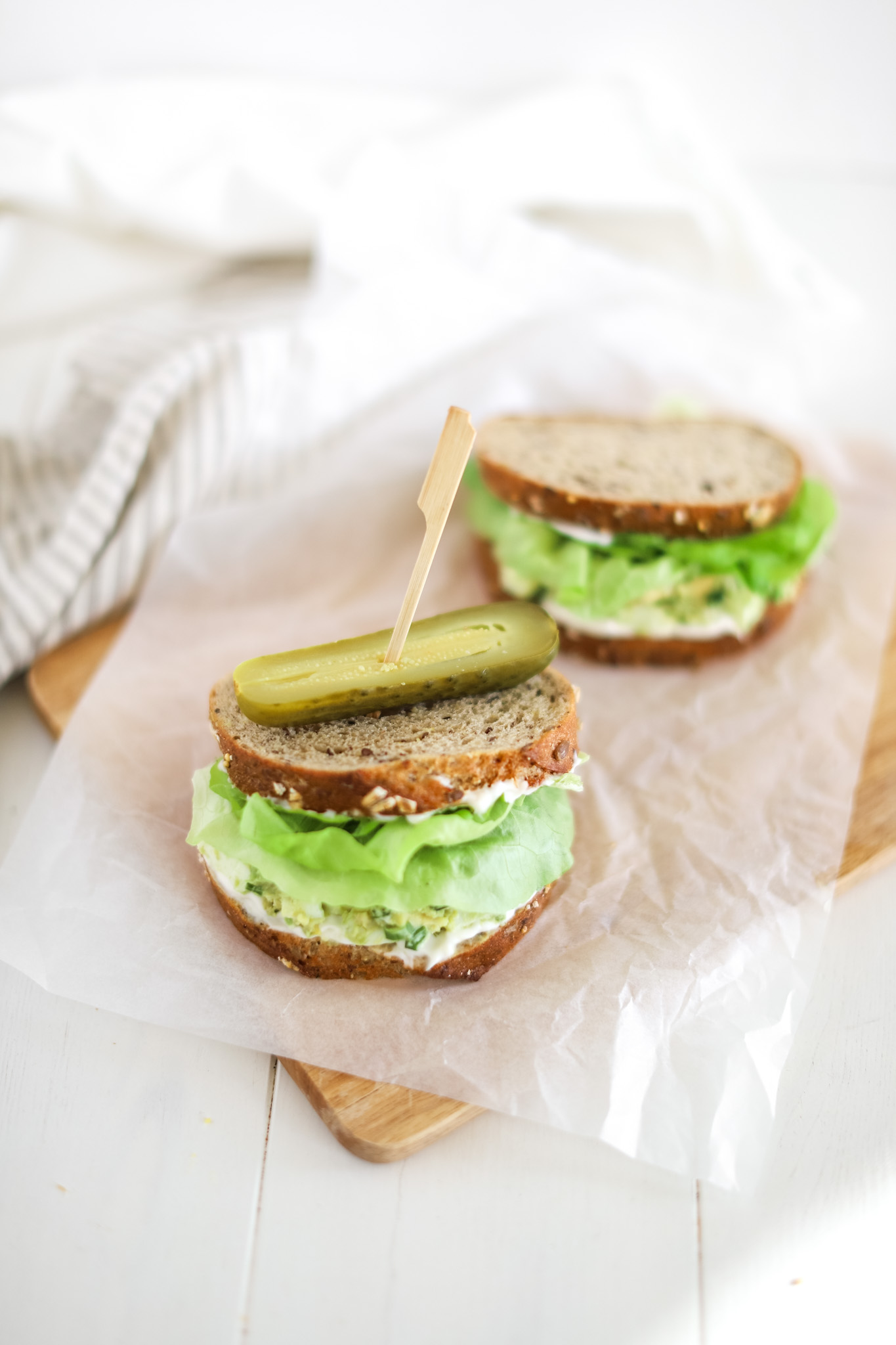 avocado egg salad sandwich with pickle