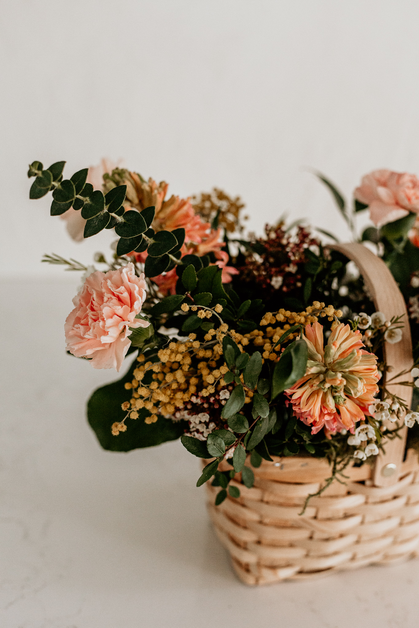 spring floral basket arrangement