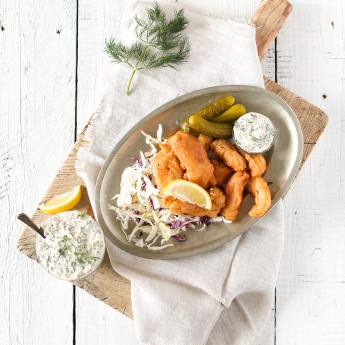 Homemade Dill Tartar Sauce serve with lemon, pickles and fried fish