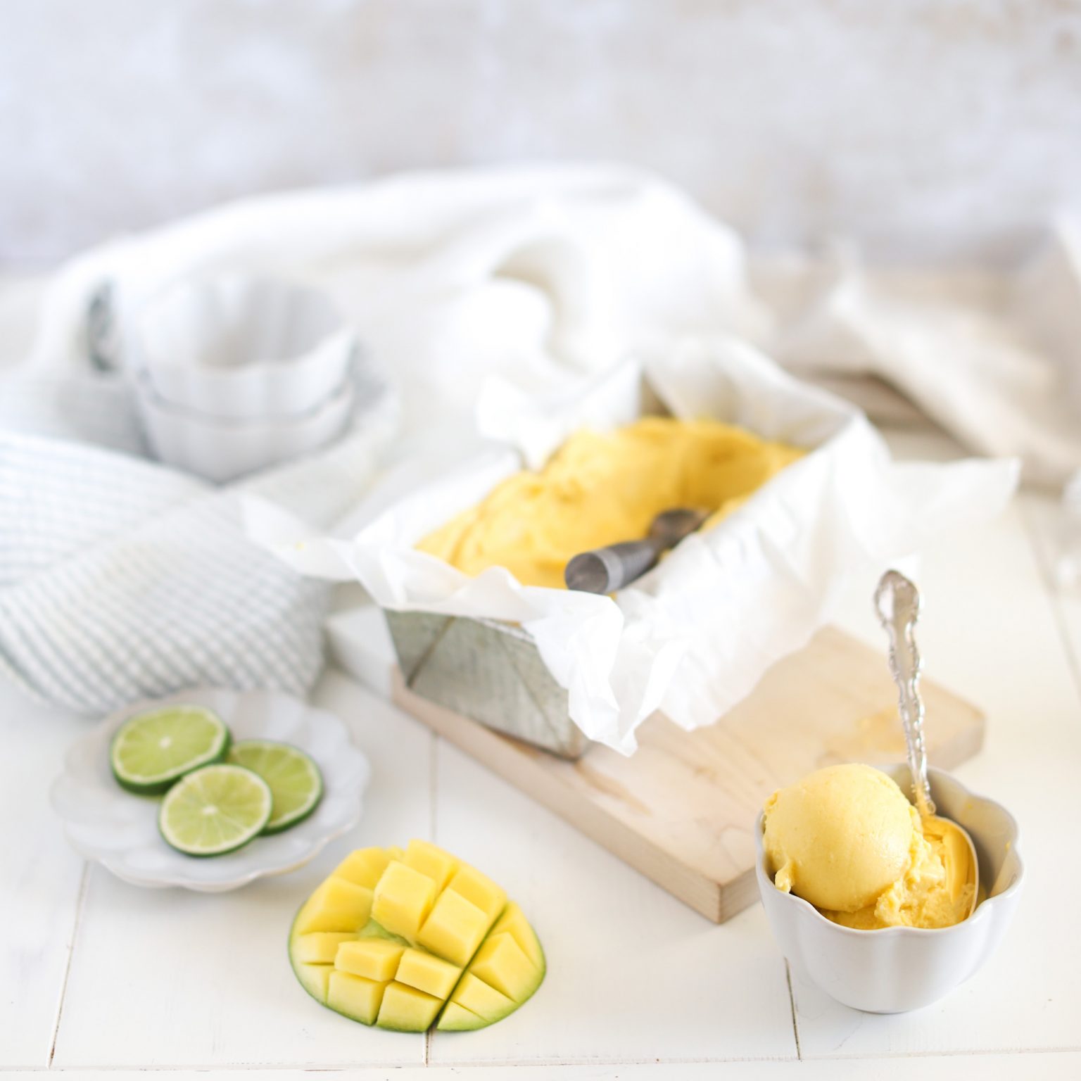 Coconut mango lime ice cream dairy-free tropical for bright refreshing summer frozen dessert