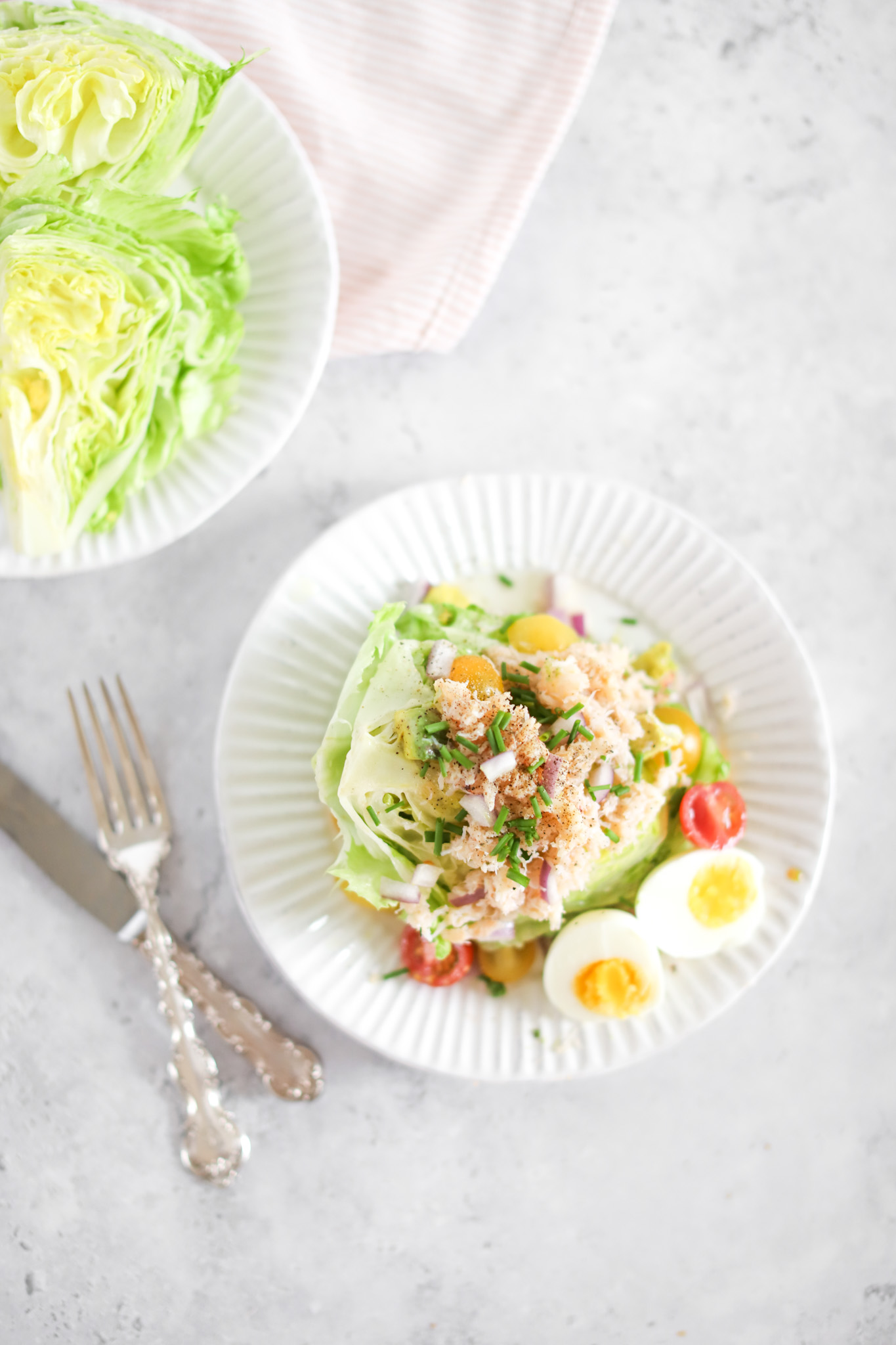 crab wedge salad ingredients on a plate with eggs 