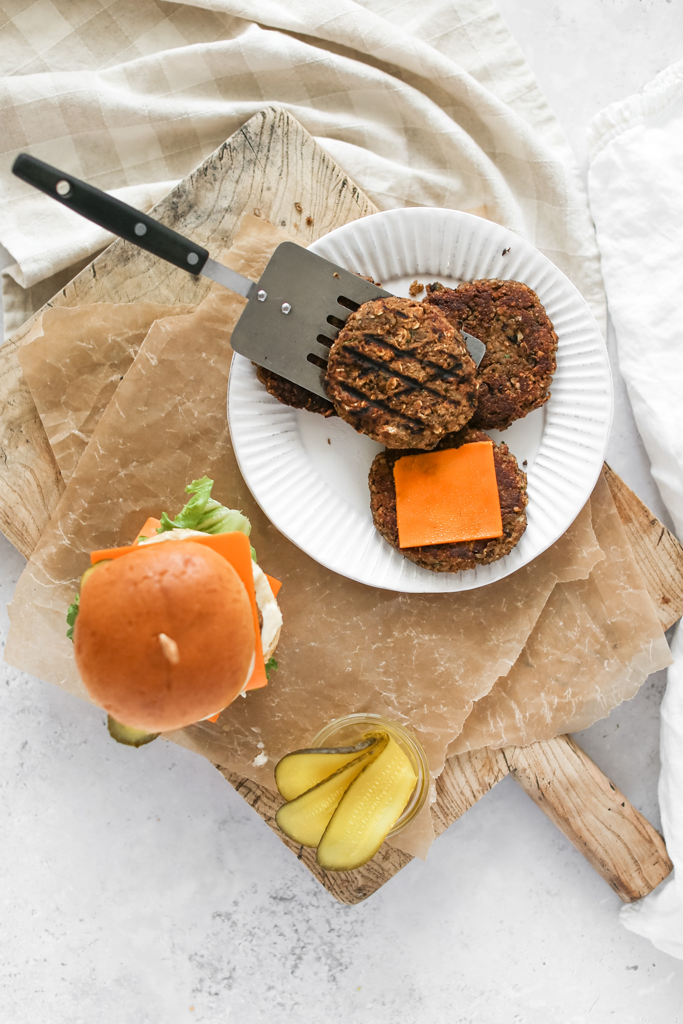 Grillable Veggie Burgers on a plate with cheese