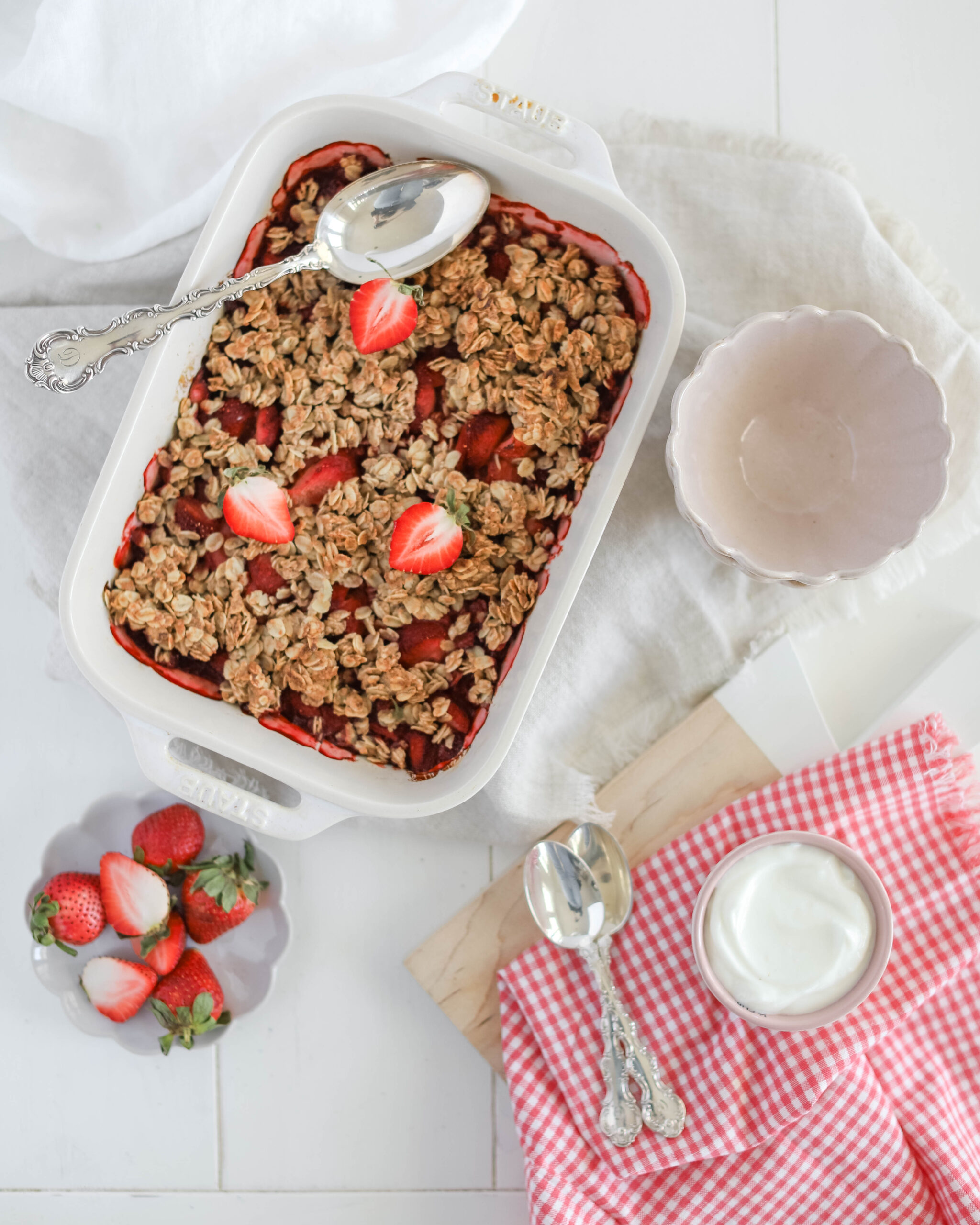 Fraîche Table: Strawberry Breakfast Crisp in baking dish with spoons and side bowls