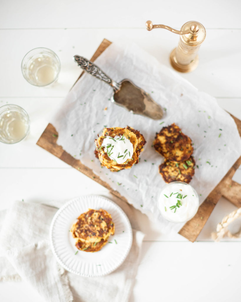 Spaghetti Squash Fritters topped with sour cream and chives