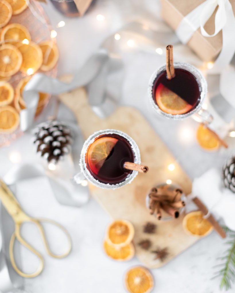 The Best DIY Mulled Wine with oranges and cinnamon sticks