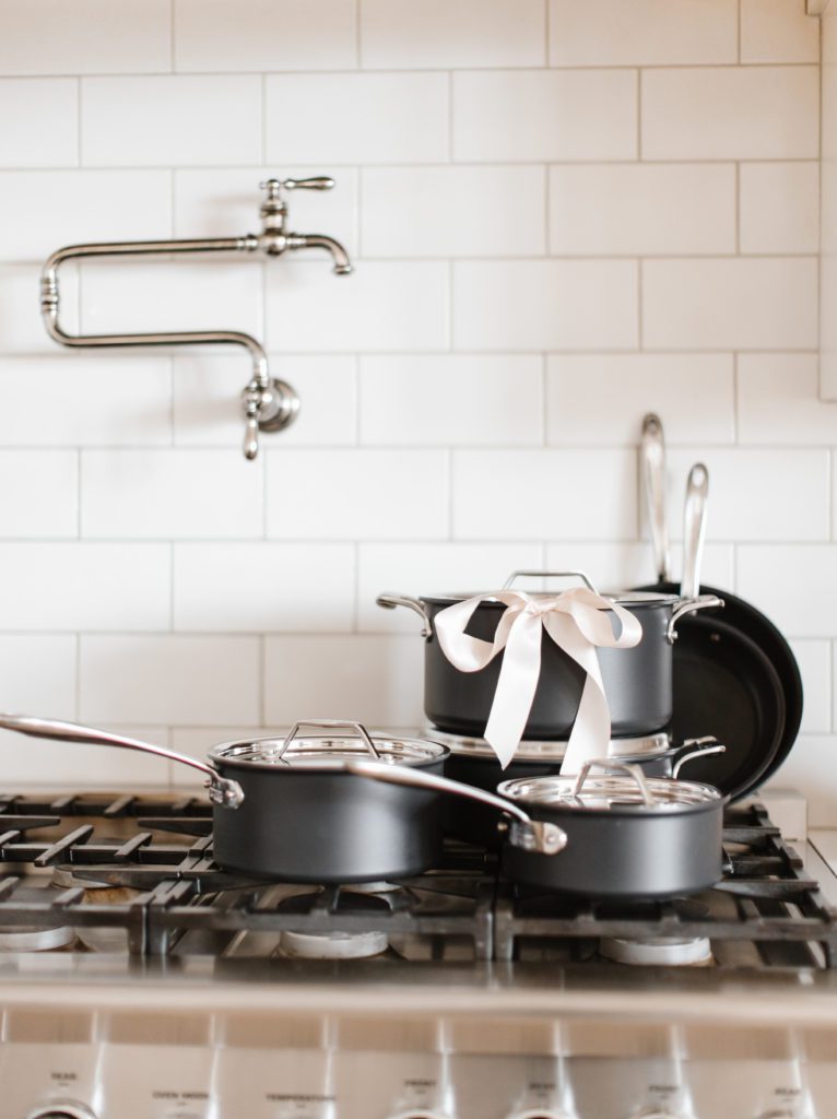 Crate & Barrel All Clad Cookware on stove
