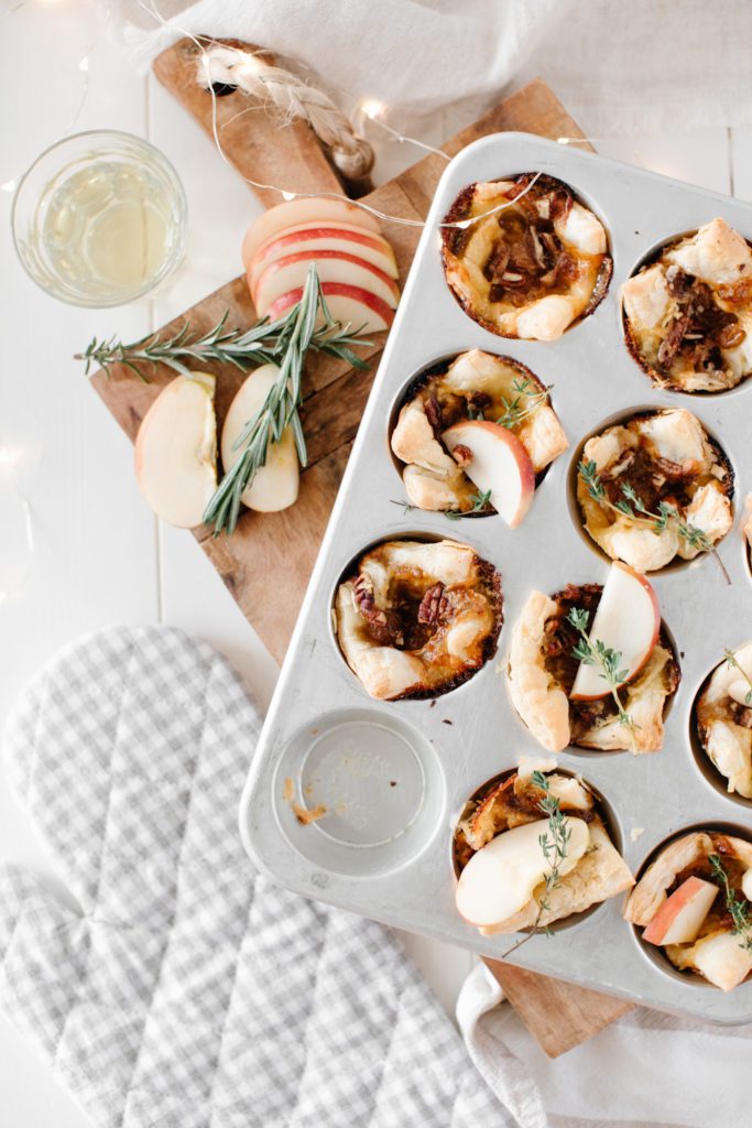 Baked brie bites in muffin tin with apple slices