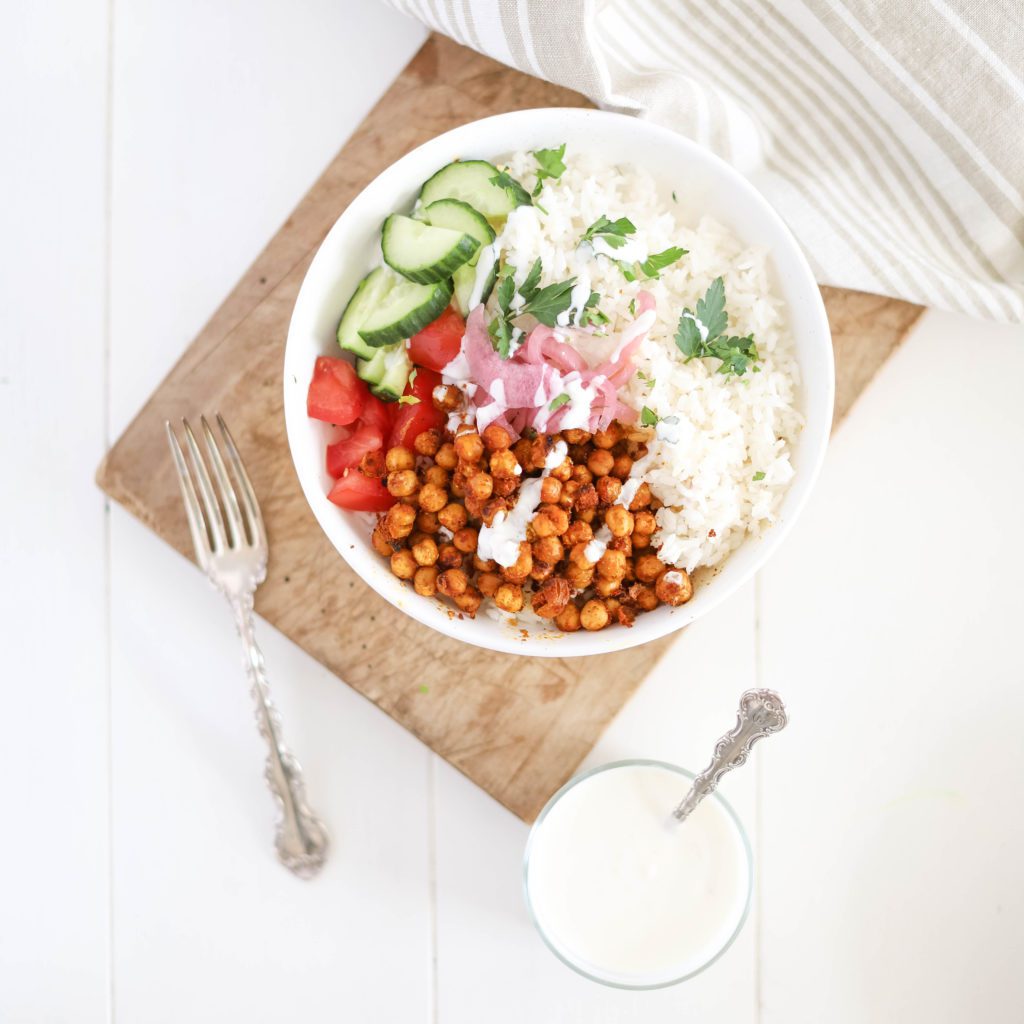 Chickpea Shawarma in a bowl with garlic sauce and vegetables