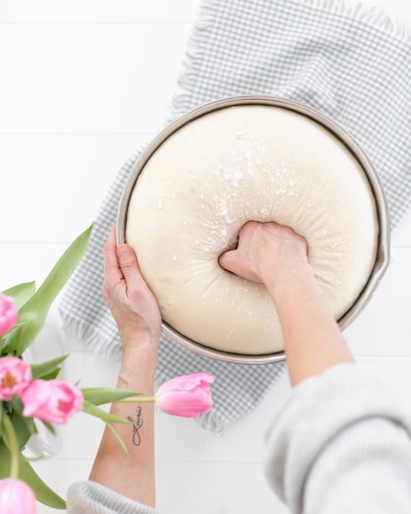 Punching dough for cinnamon buns