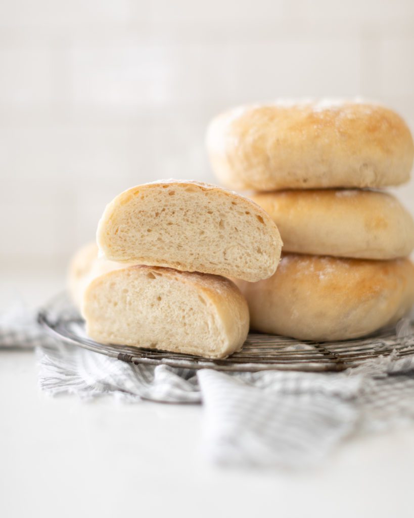 stack of Ciabatta Buns with one cut in half