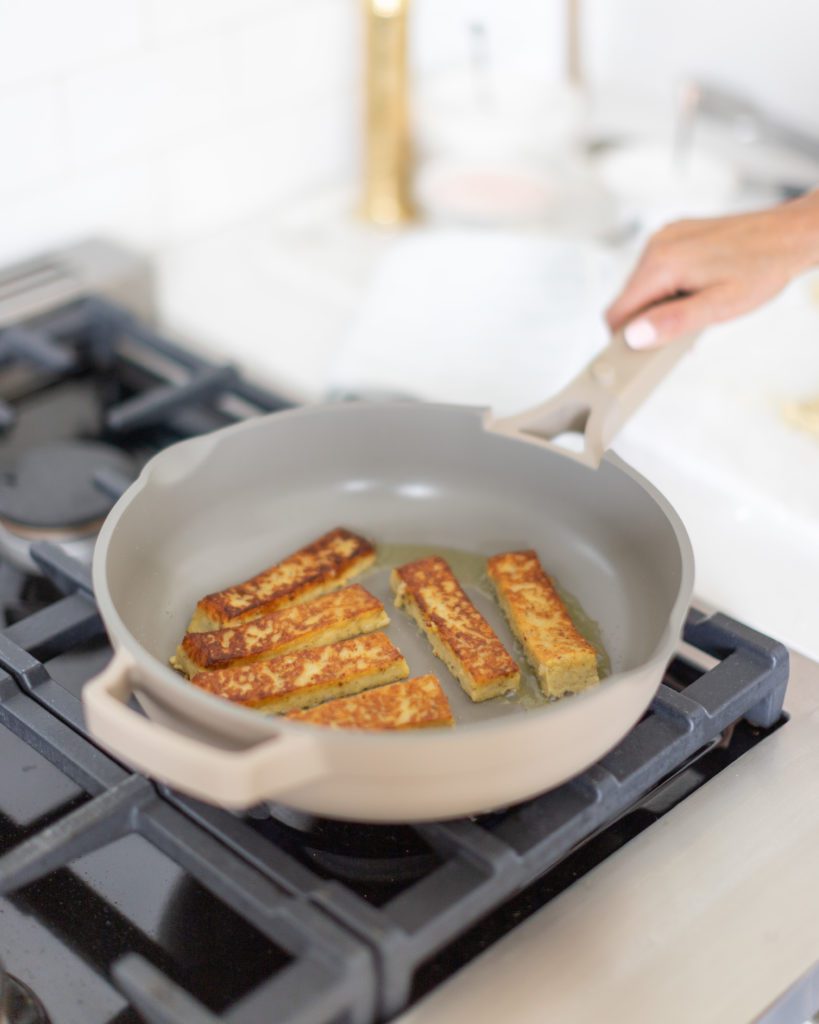 Frying up Panisse Chickpea Fries in a skillet