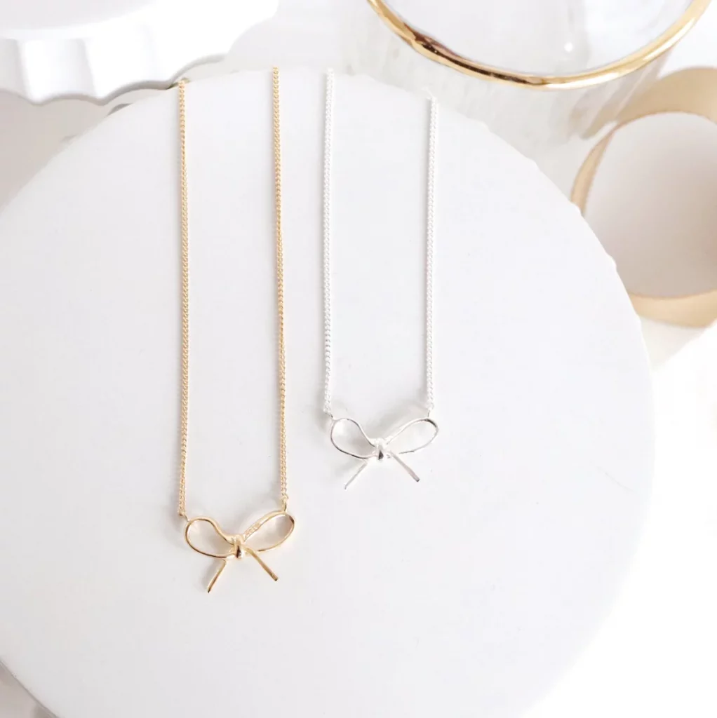 silver and gold bow tie necklaces TeamJiX