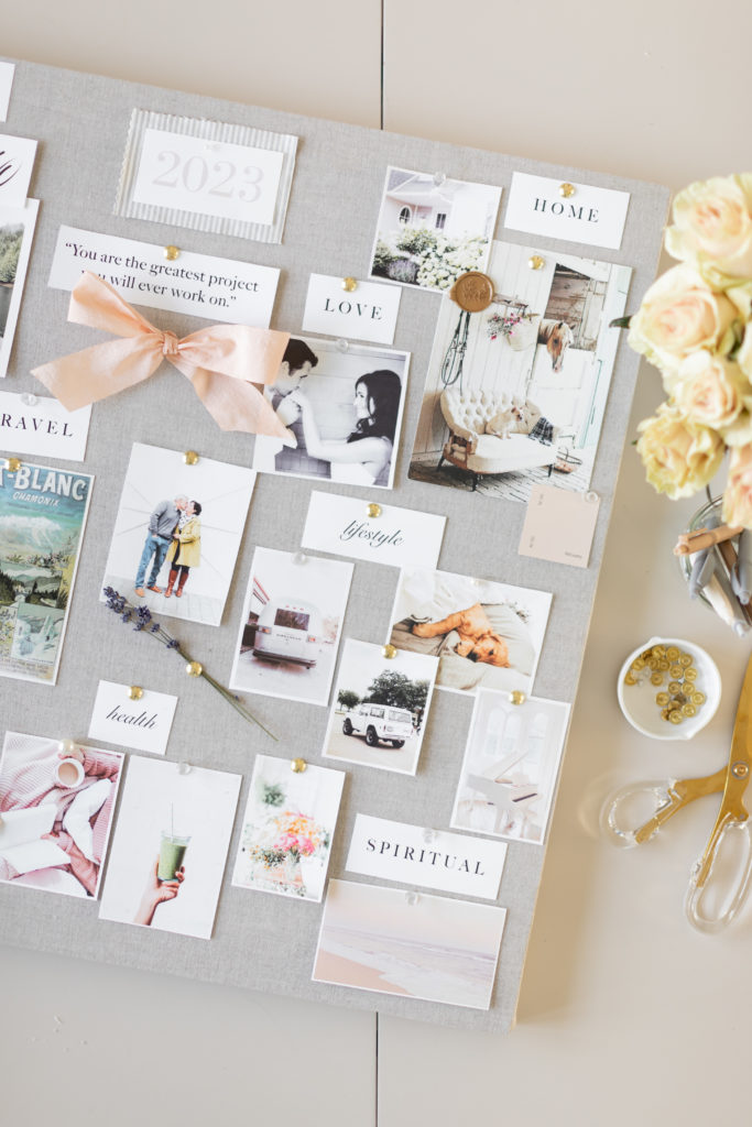 a closeup of a DIY Vision Board with pictures and labels that read: love, home, health, lifestyle