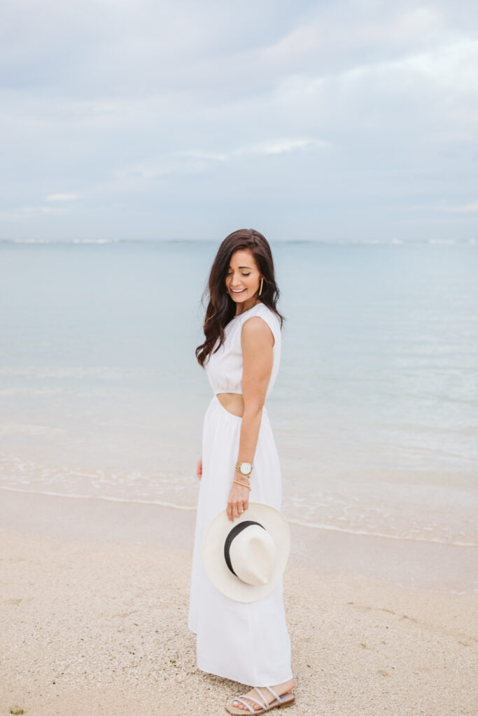 Tori in the Monaco White Cut-Out Dress in the water of Hawaii