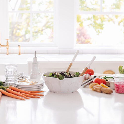 vegetables and fruit on a white kitchen counter
