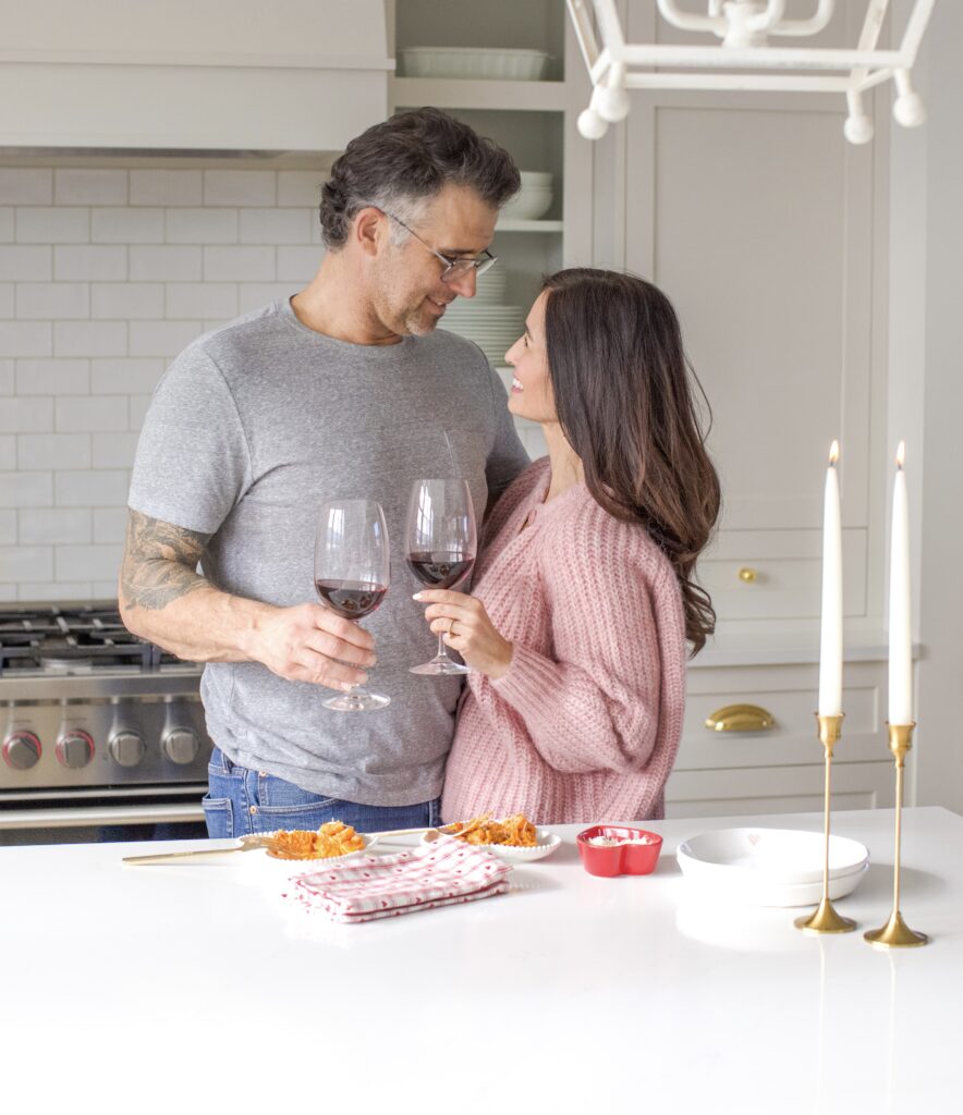 Woman and man in kitchen making Date Night Rigatoni